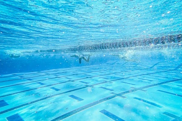 synchronized swimmers underwater